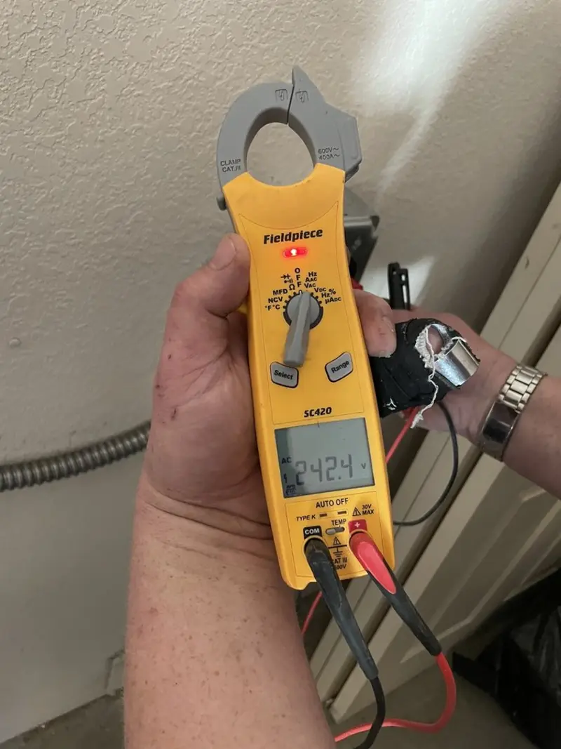 Voltage testing with clamp meter during Generator Installation in Edison